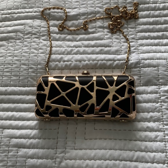 Sephora Handbags - Sephora small black/gold purse